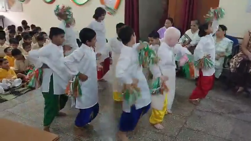 Visually impaired students performing a dance at Captain Chandanlal Special School for the Blind